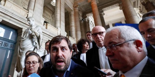 FILE PHOTO: Dismissed former Catalan Minister of Culture Lluis Puig Gordi, regional Minister of Health Antoni Comin and regional Minister for Agriculture, Meritxell Serret talk to the media after appearing in court in Brussels