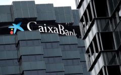 Caixabank şi Bankia formează cel mai mare grup bancar spaniol, cu active de 650 de miliarde de dolari