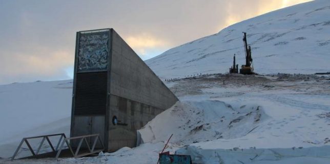 The entrance to the Svalbard Global Seed Vault (SGSV) is pictured outside Longyearbyen on the Svalbard archipelago, Norway, February 25, 2018. In the background are machines for reconstructing the access tunnel to the vault after water flowed into it in la