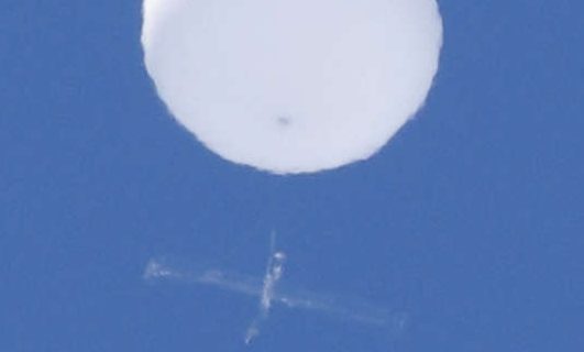 A balloon-like white object in the sky is pictured in Sendai